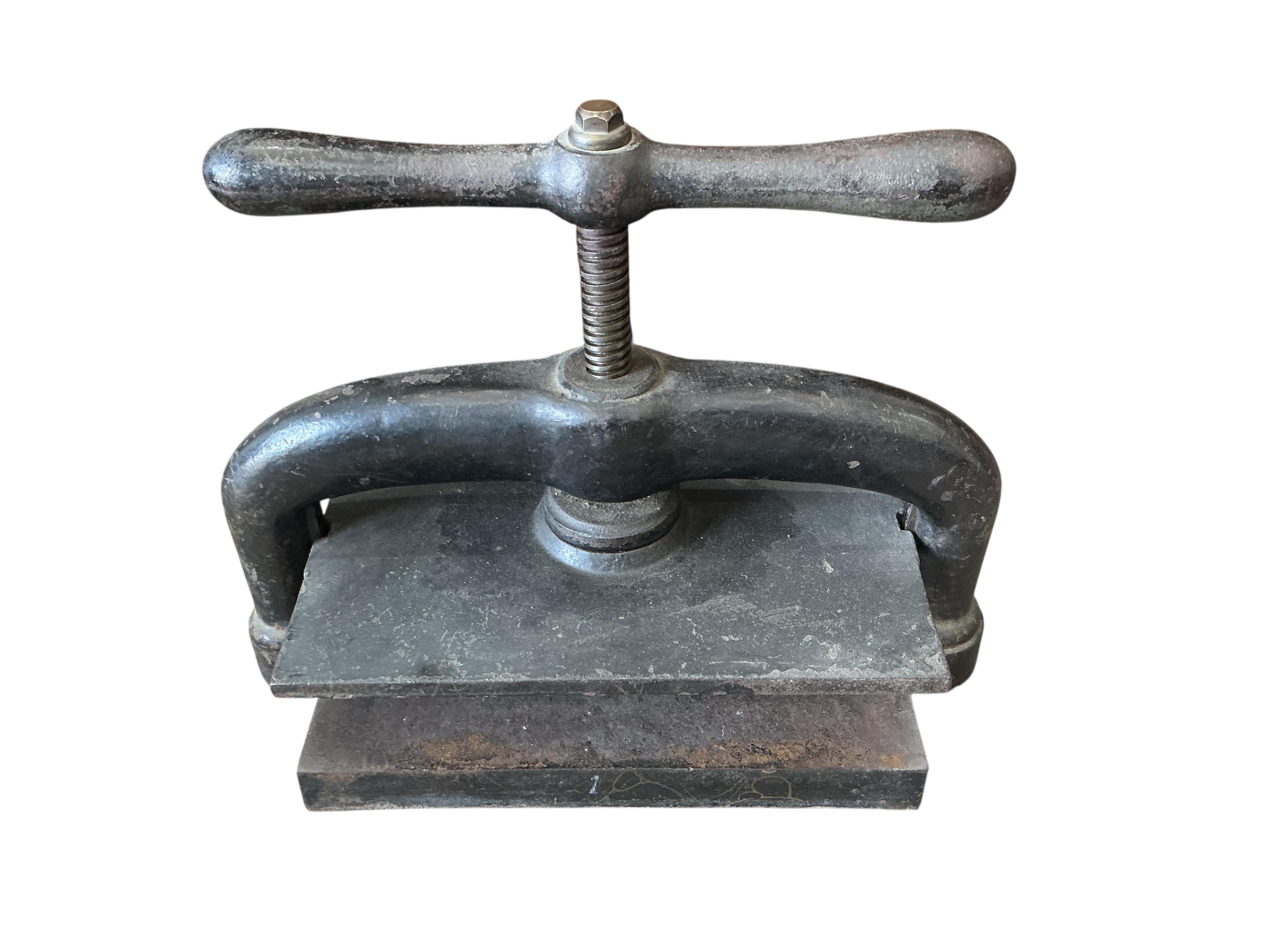 A Victorian cast iron book press, width 48cm, depth 25cm, height 37cm